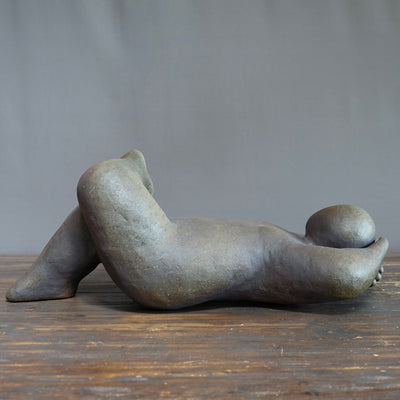 Recliner with Head in Hands by Joy Brown