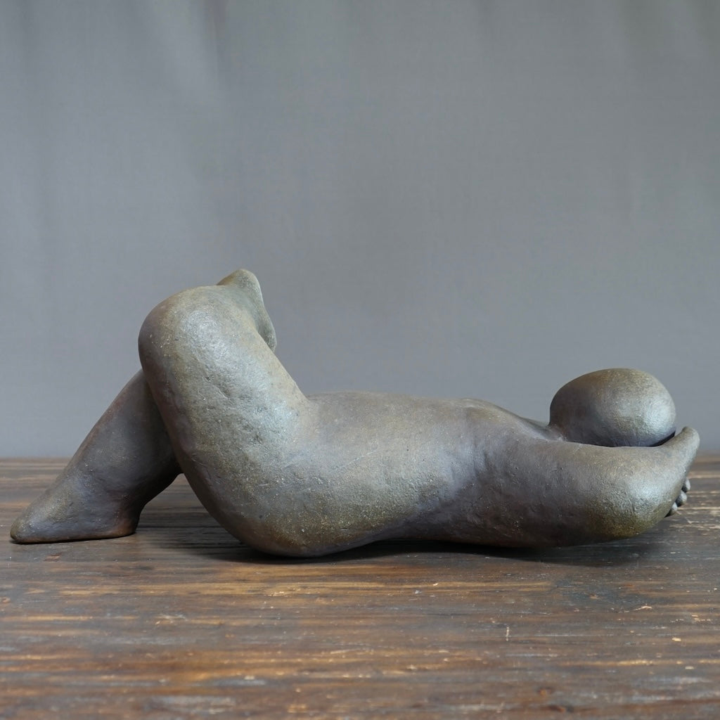 Recliner with Head in Hands by Joy Brown